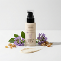 Silk Skin Moisturizer bottle with flowers and leaves on a white background
