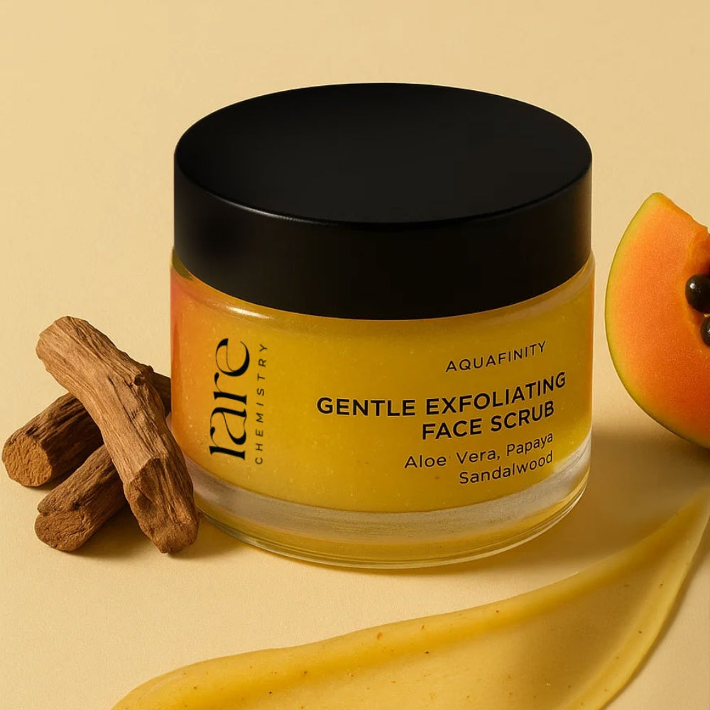 Jar of 'Gentle Exfoliating Face Scrub' with papaya and sandalwood on a beige background