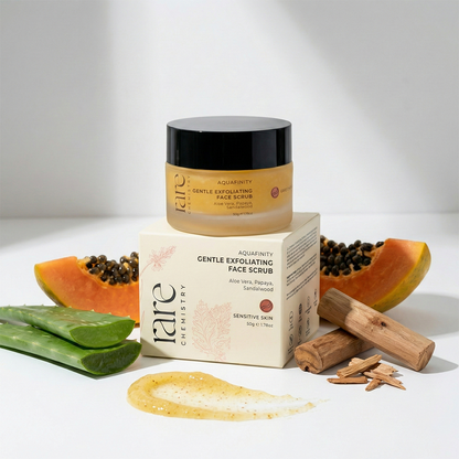 Jar and box of 'Rare Chemistry' face scrub with papaya and aloe vera on a white background