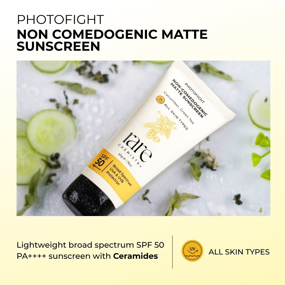 Tube of Photofight non-comedogenic matte sunscreen with cucumber slices and herbs in the background