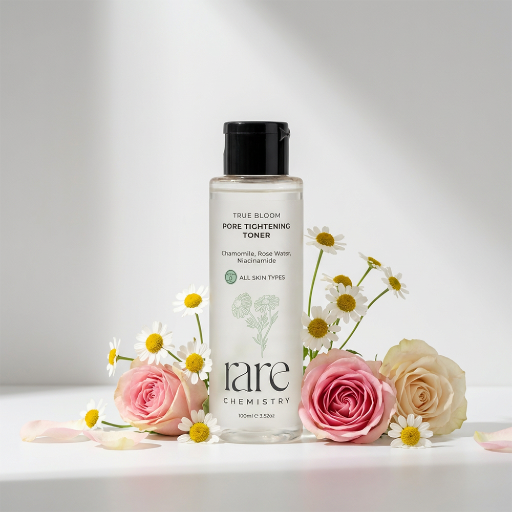 Bottle of 'rare chemistry' toner with flowers on a light background