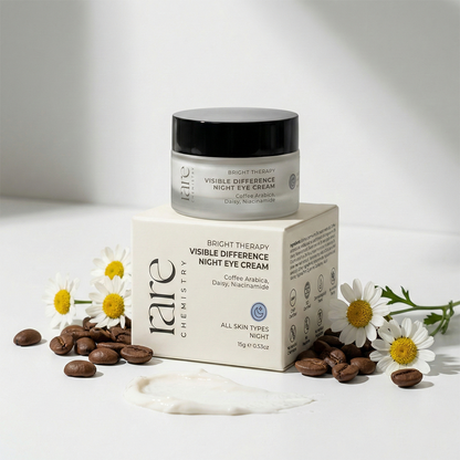 Jar of cream and its packaging with coffee beans and daisies on a light background
