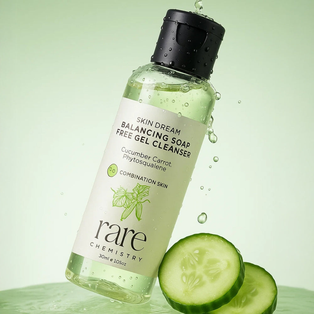 Bottle of 'rare Chemistry' skin care product with cucumber slices on a green background